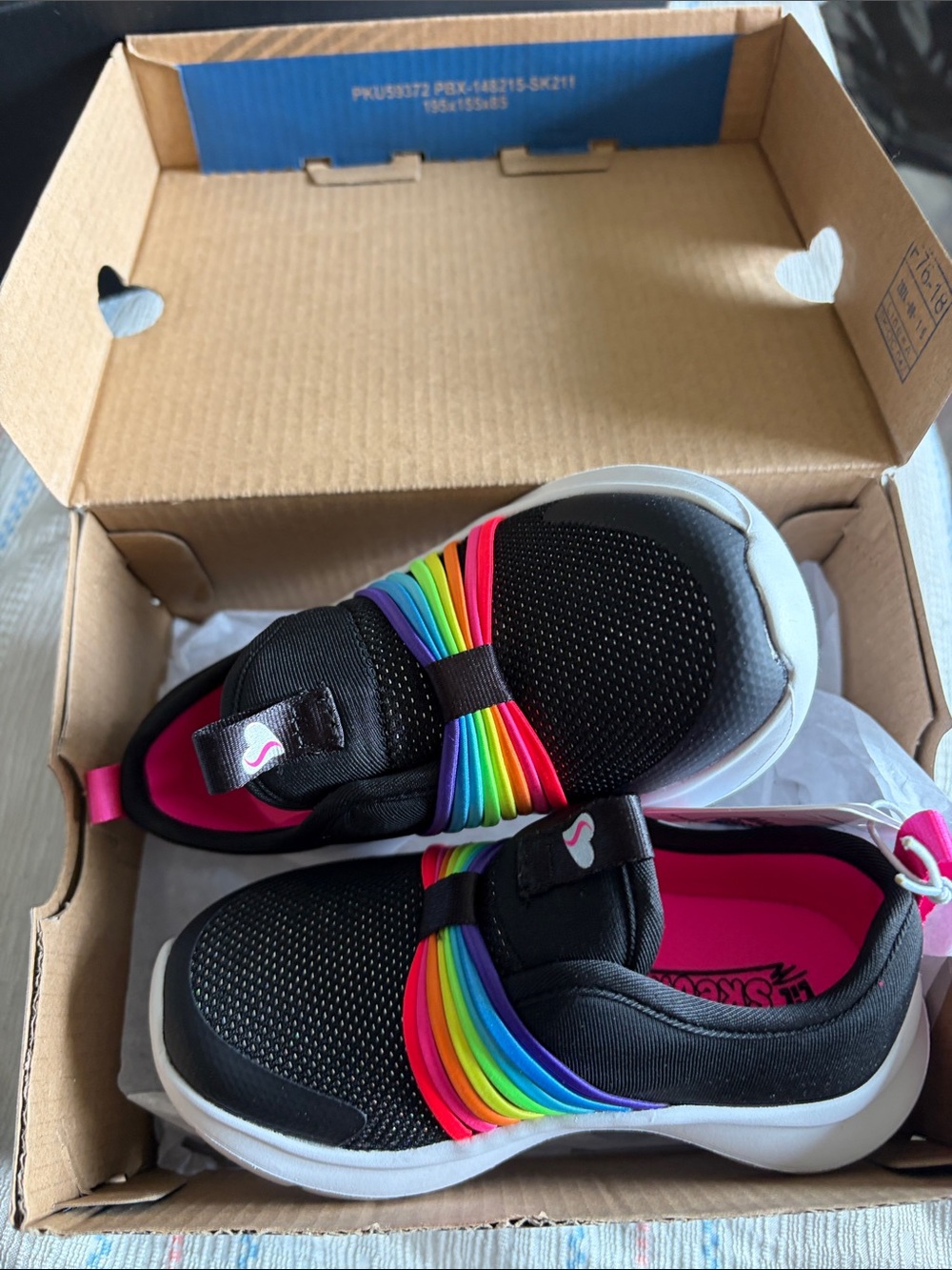 Skechers Kids Black Slip-On Sneakers with Rainbow Accent